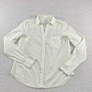 GAP woman’s Button Down Shirt yellow green stripes pastel yellow background.